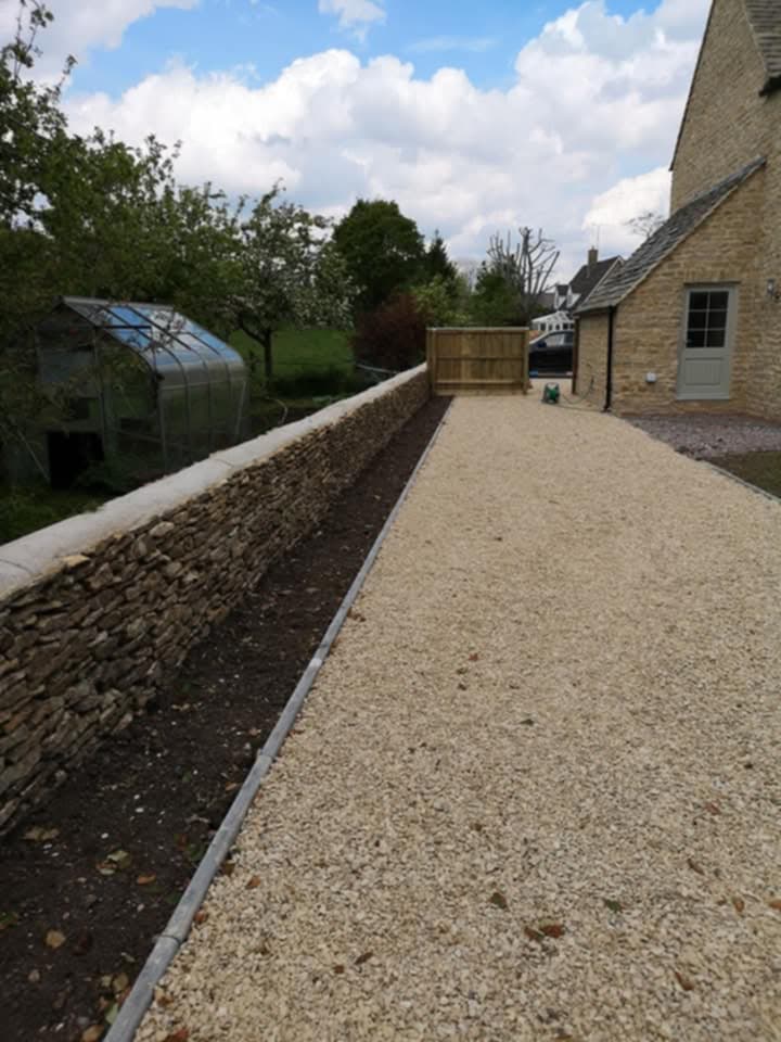 Dry stone wall construction in Cirencester, Cotswolds