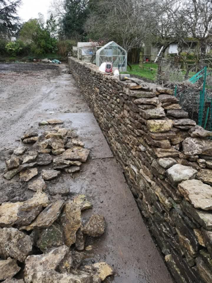 Dry stone wall restoration project in Cirencester